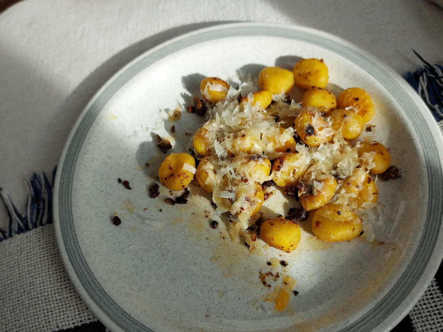 15-Minute Butter Gnocchi with Spicy Chili Crisp, Capers and Parmesan